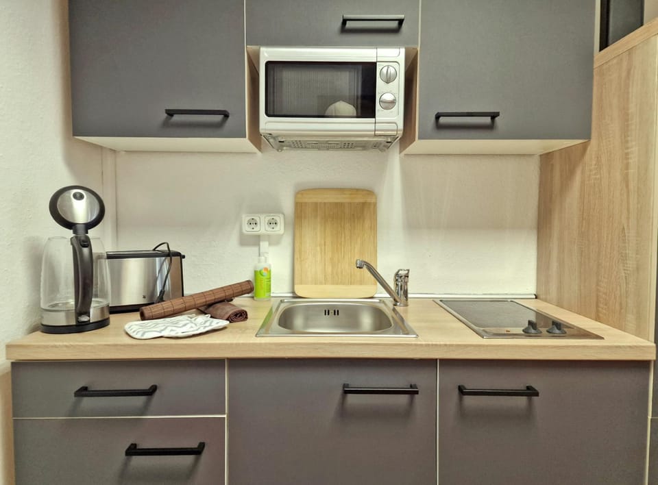 Kitchen or kitchenette, stove, kitchen, kitchen