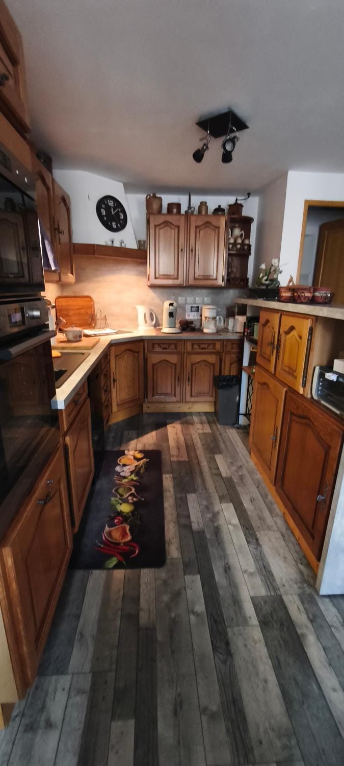 Kitchen or kitchenette, dishwasher, oven, stove