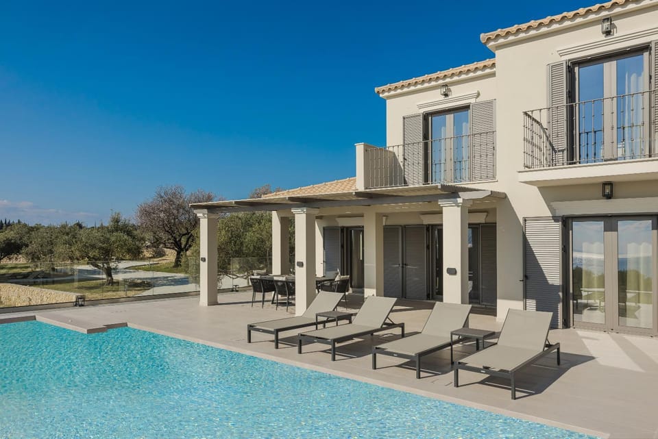 Property building, Patio, Pool view, Swimming pool, sunbed