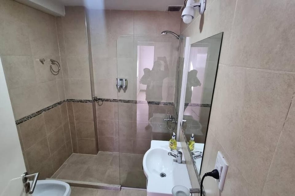 Shower, Toilet, Bathroom, bidet, hair dryier, towels