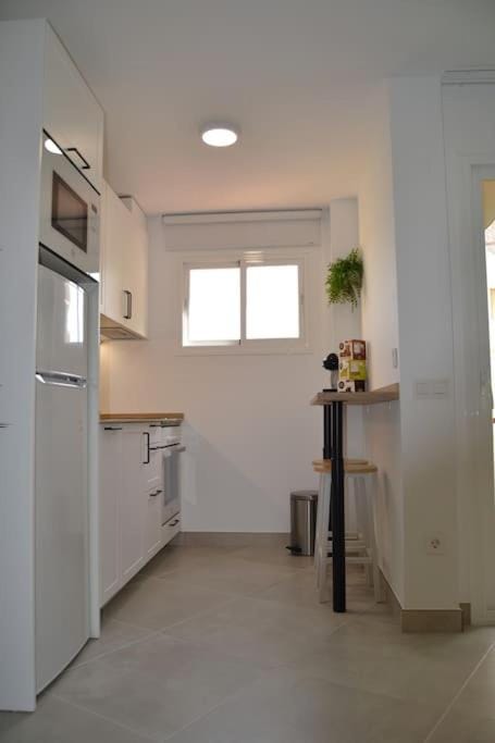 Kitchen or kitchenette, oven, stove