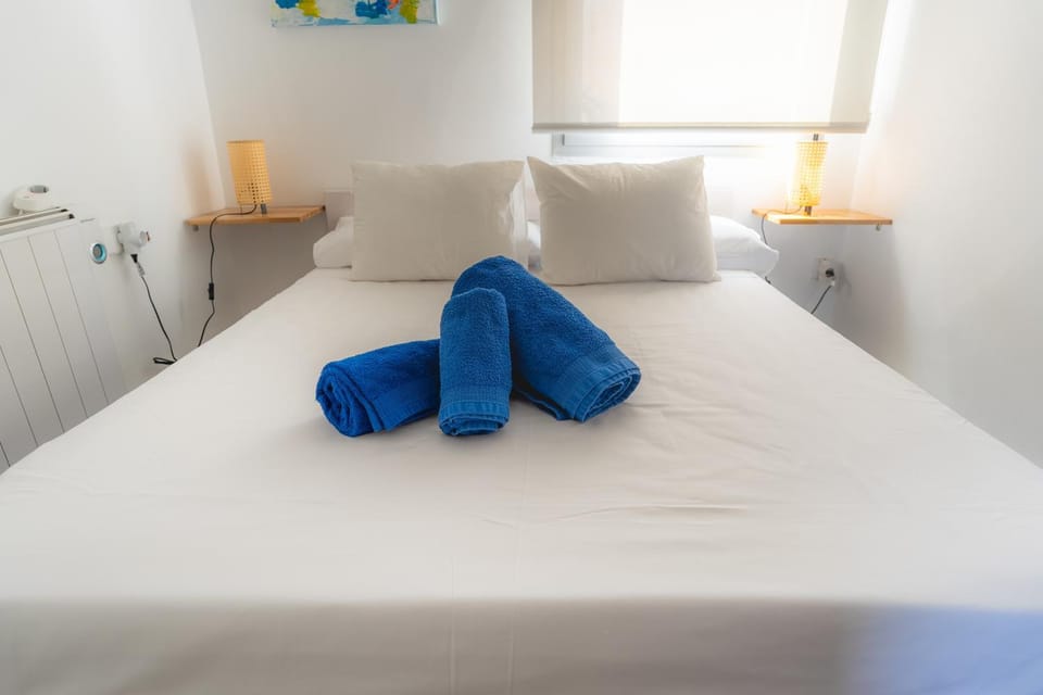 Bed, City view, towels