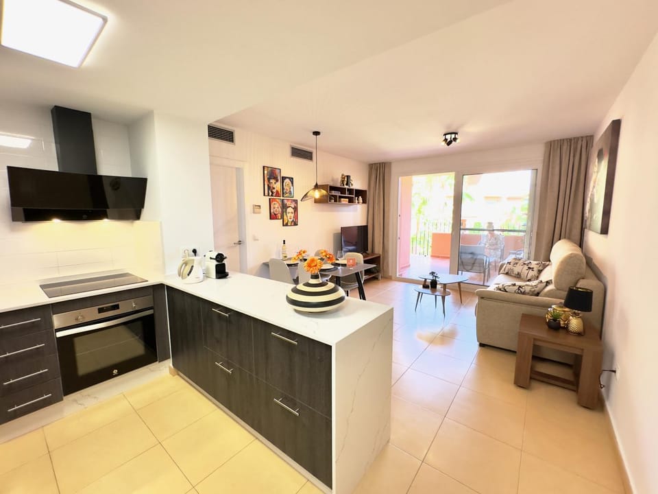 TV and multimedia, Kitchen or kitchenette, Living room, Dining area, oven, stove, toaster, air conditioner