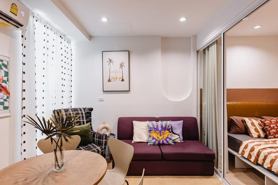 Bed, Living room, Seating area, Bedroom