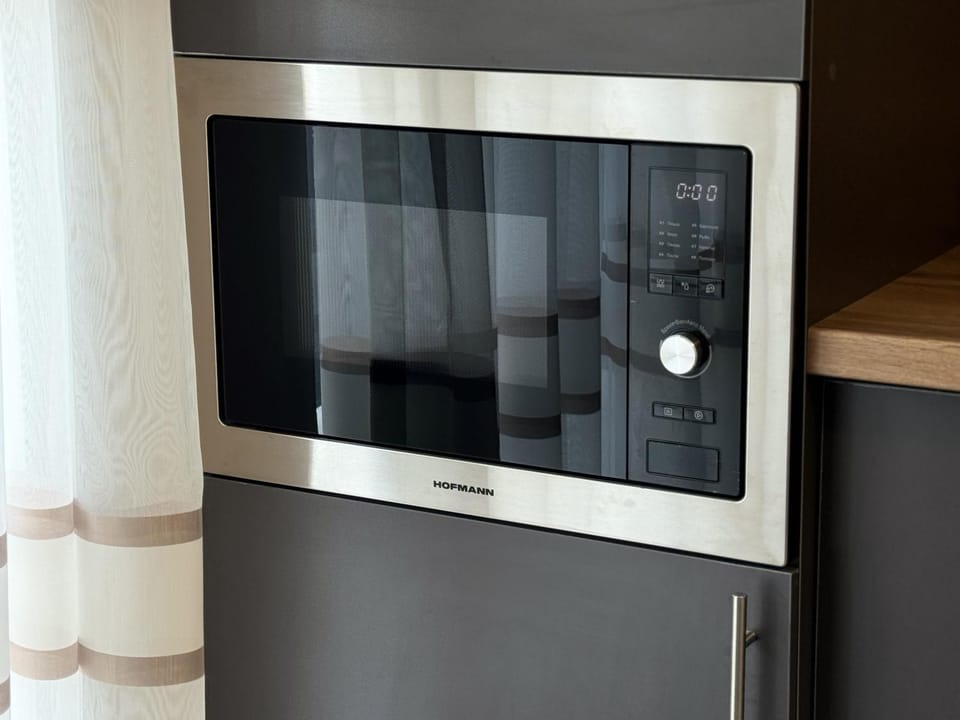 Kitchen or kitchenette, microwave