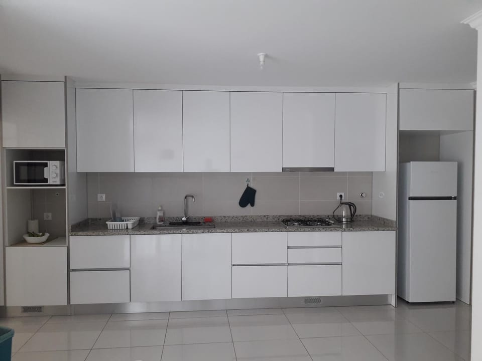 Kitchen or kitchenette, oven