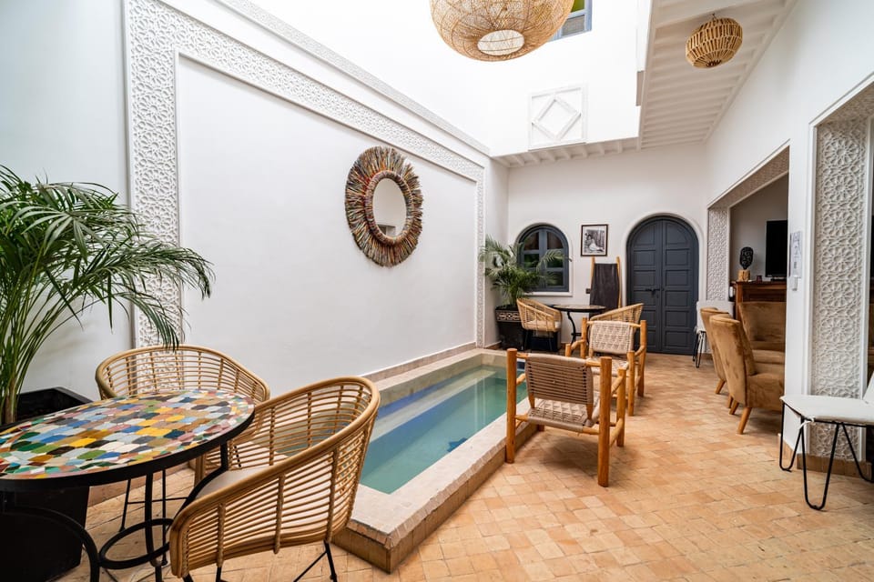 TV and multimedia, Living room, Seating area, Pool view, Swimming pool, sunbed
