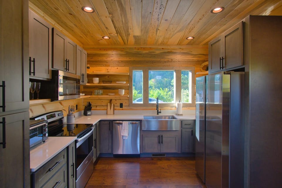 Kitchen or kitchenette, dishwasher, oven, stove, toaster