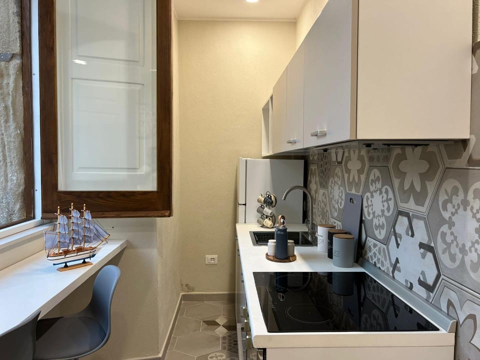 Kitchen or kitchenette, stove