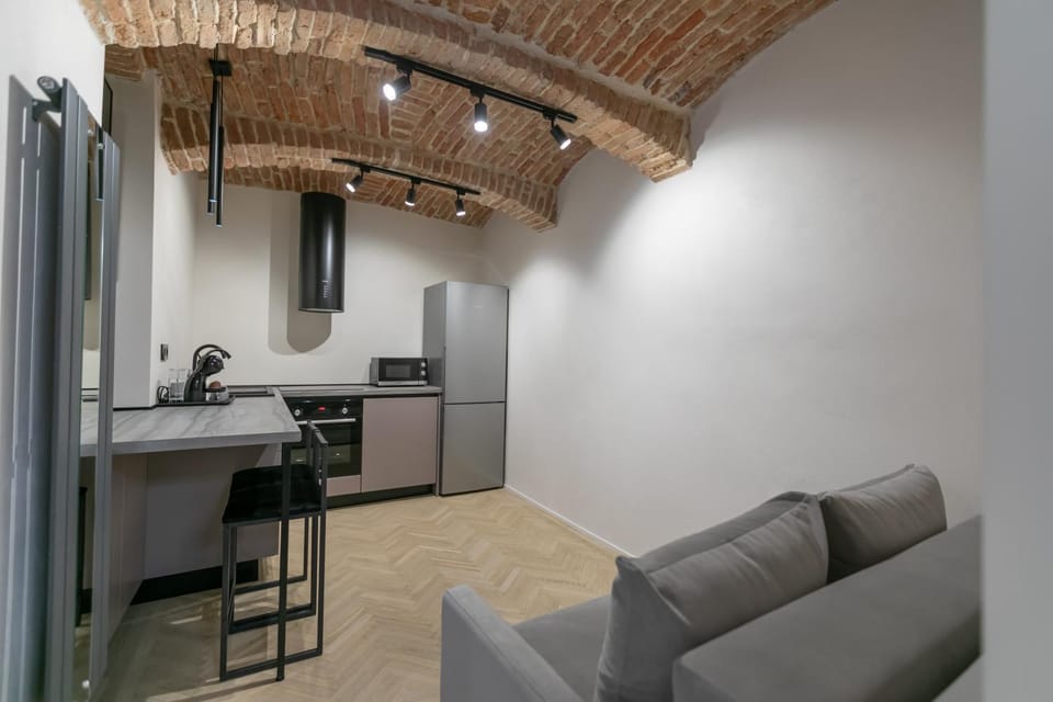 Kitchen or kitchenette, Living room, Seating area, Dining area