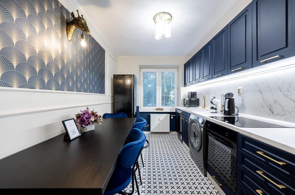 Kitchen or kitchenette, dishwasher, oven, stove, toaster