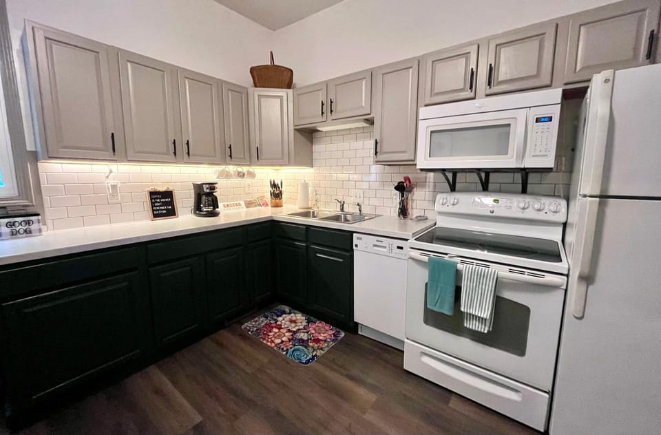 Kitchen or kitchenette, dishwasher, microwave, oven, stove, toaster