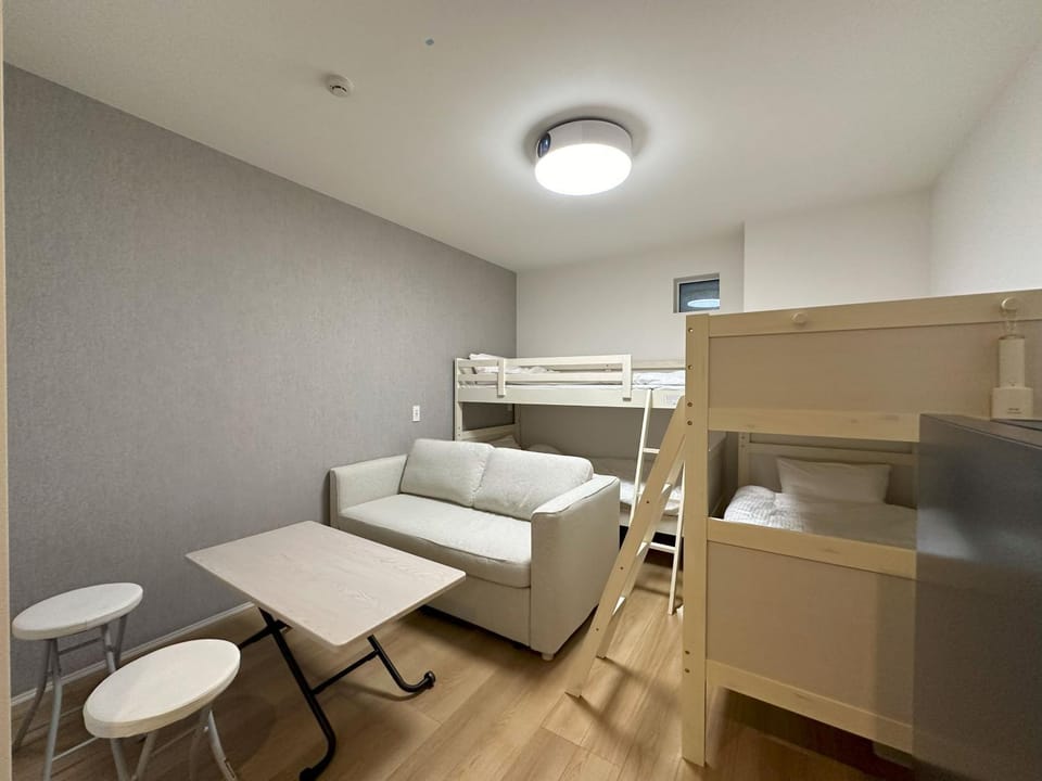 Bed, Living room, Seating area, Bedroom