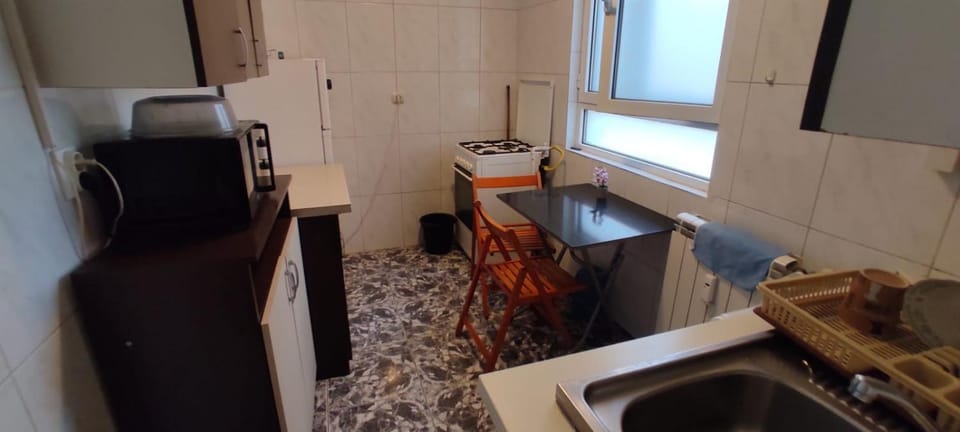Kitchen or kitchenette, Seating area, Dining area, oven, stove, washing machine, kitchen