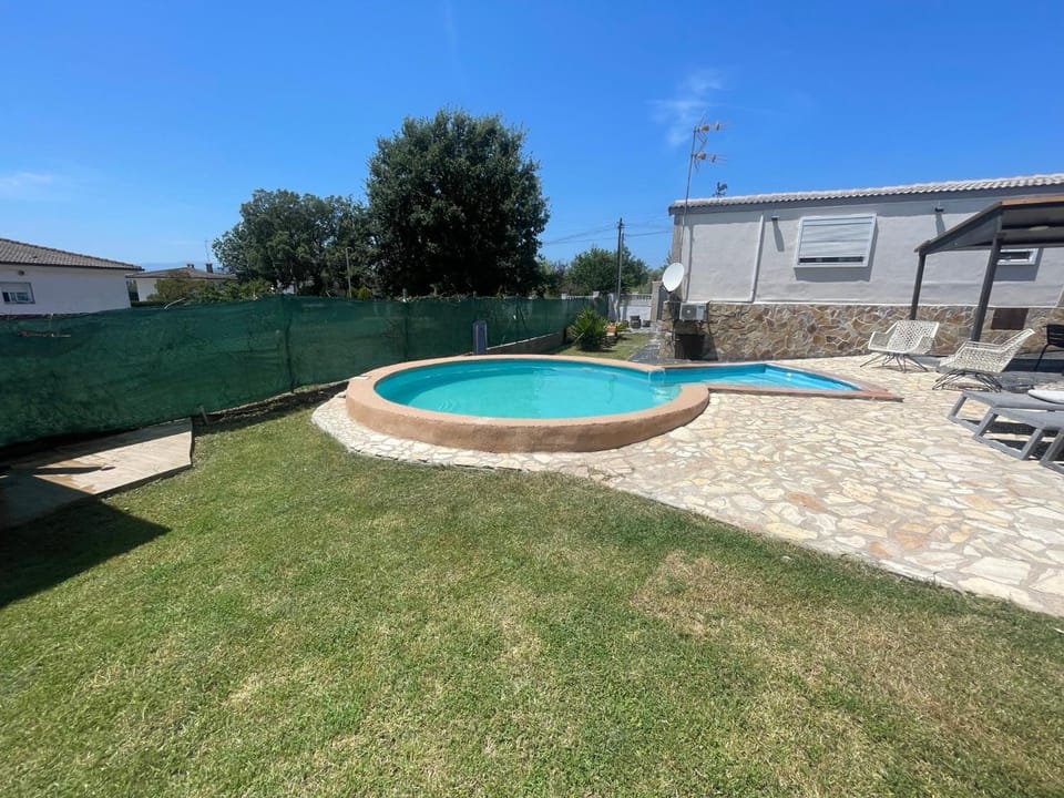 Property building, Living room, Swimming pool