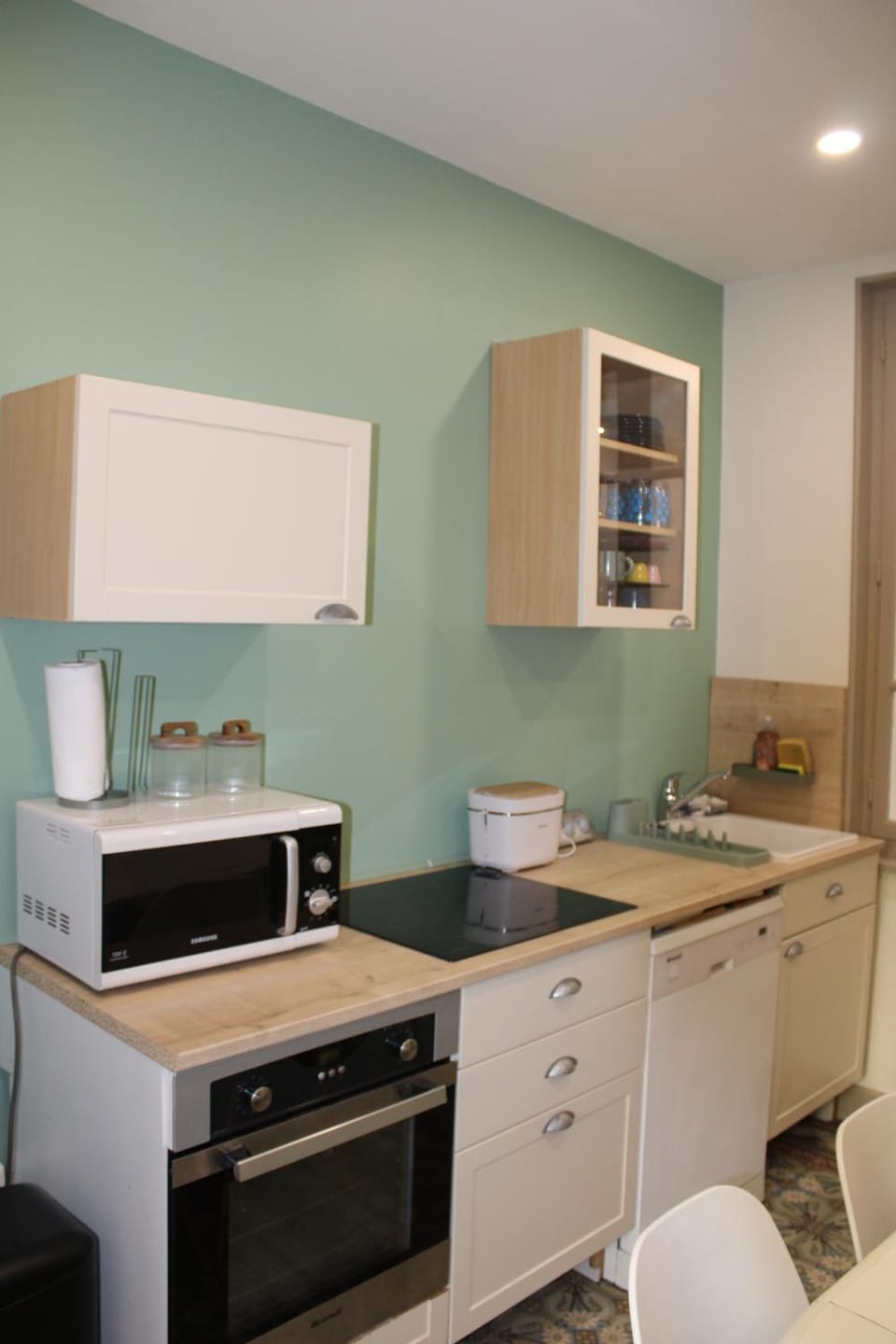 Kitchen or kitchenette, dishwasher, oven, stove, toaster