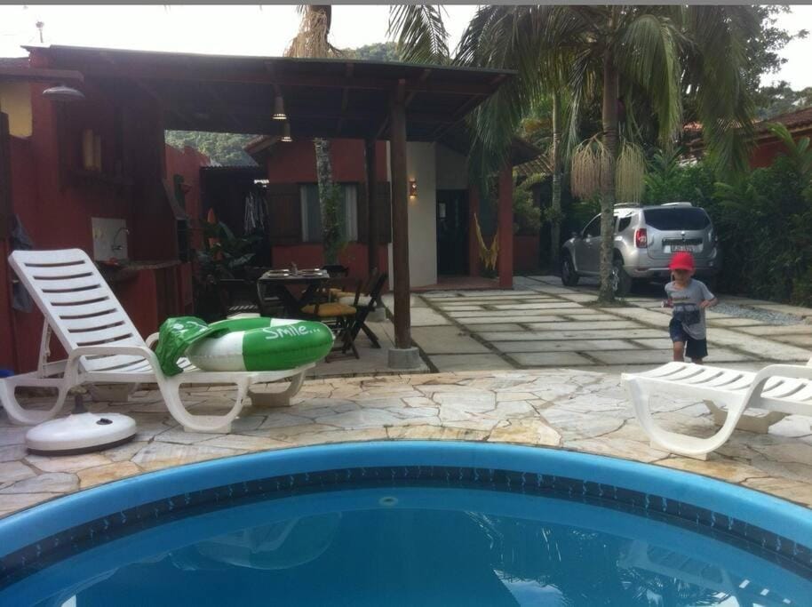 Swimming pool, sunbed