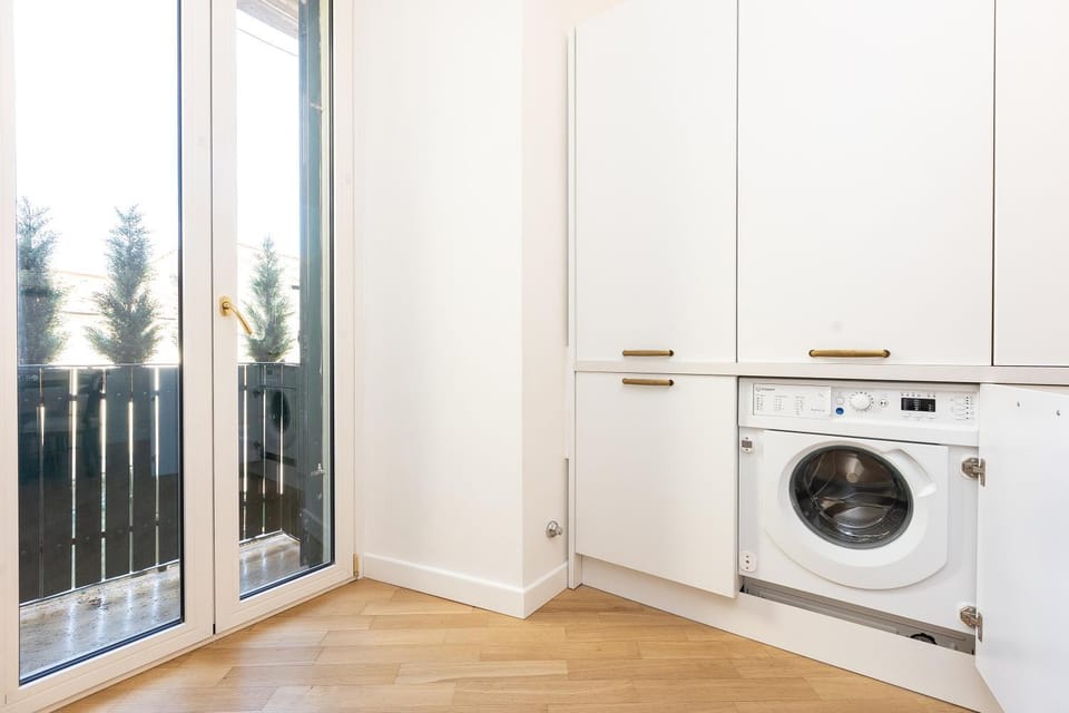 Kitchen or kitchenette, washing machine