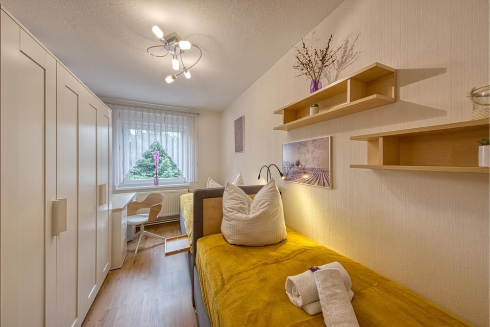 Bed, Photo of the whole room, Seating area, Bedroom, towels, wardrobe