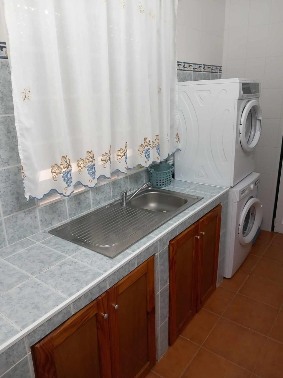 Kitchen or kitchenette, dishwasher, oven, stove, washing machine, dryer