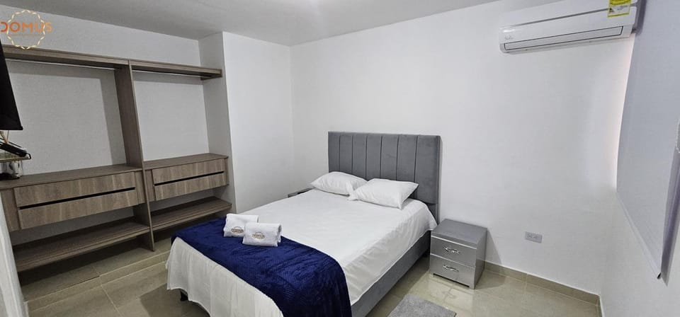 Bed, Photo of the whole room, Bedroom, towels, air conditioner