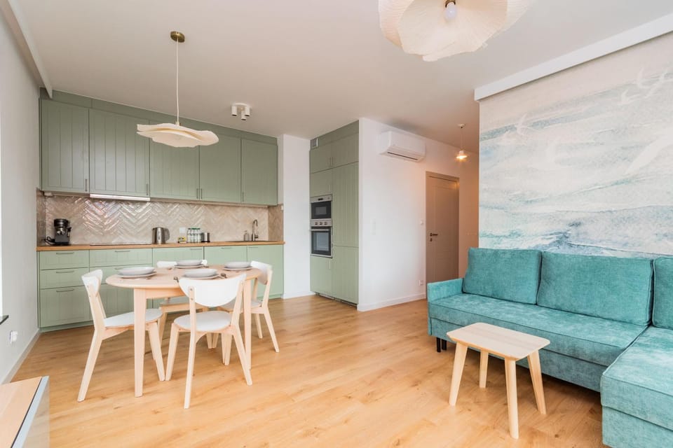 Kitchen or kitchenette, Living room, Seating area, Dining area