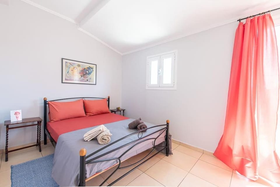 Bed, Photo of the whole room, Bedroom, flat iron, hair dryier, towels