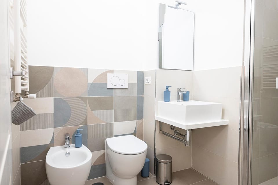 Shower, Toilet, Bathroom, bidet, hair dryier, towels