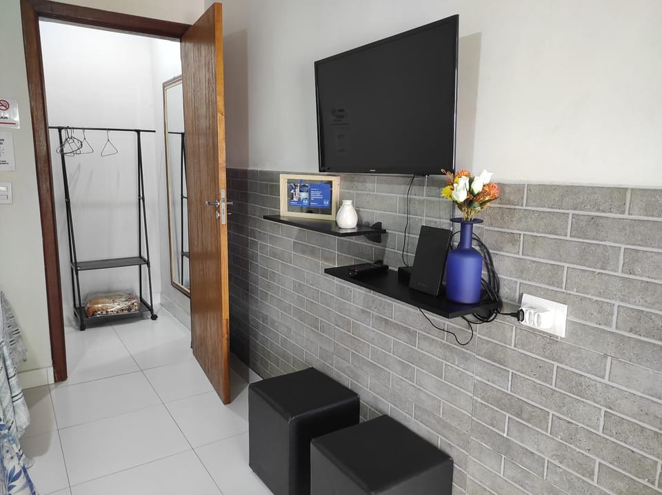 Suíte privativa no Bairro Custódio Pereira próximo ao Campus Umuarama UFU Vacation rental in Uberlândia