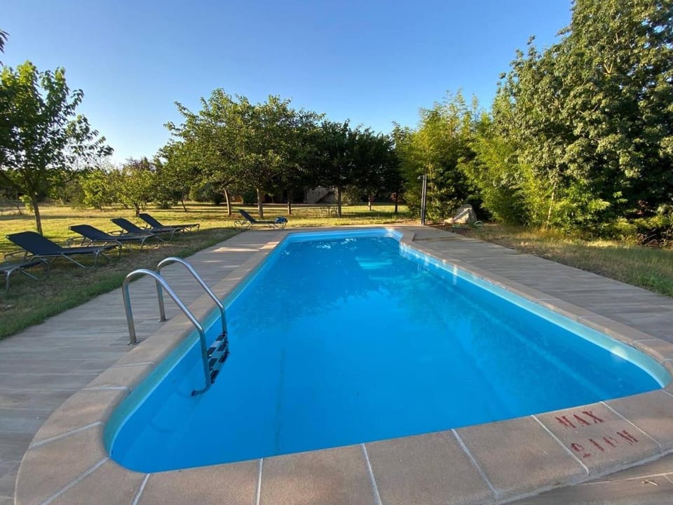 Swimming pool, sunbed