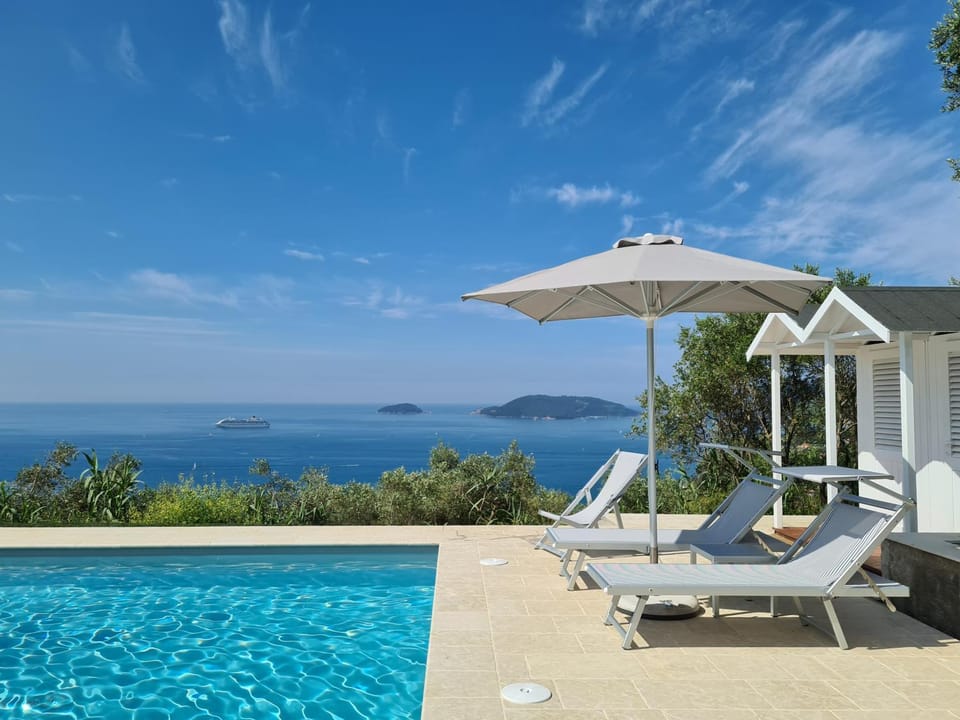 Nearby landmark, Pool view, Sea view, Swimming pool, sunbed, towels