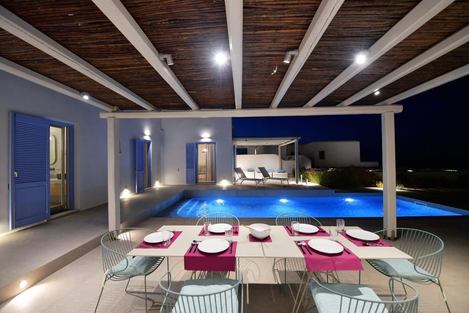 Patio, Night, Seating area, Pool view, Swimming pool