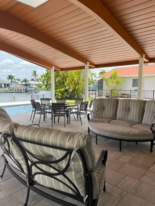 Patio, Day, View (from property/room), Balcony/Terrace, Seating area, Pool view, Swimming pool, sunbed