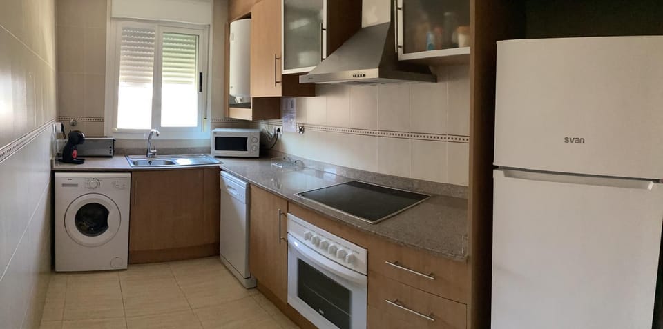 Coffee/tea facilities, Kitchen or kitchenette, dishwasher, microwave, oven, stove, toaster, washing machine, kitchen