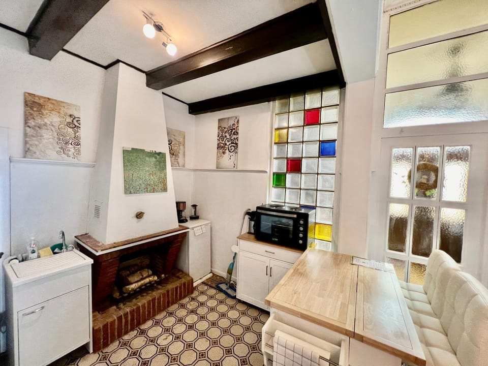 Kitchen or kitchenette, stove, toaster