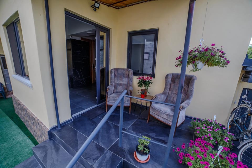 Patio, Facade/entrance, Day, Garden, View (from property/room), Balcony/Terrace, Seating area, Garden view