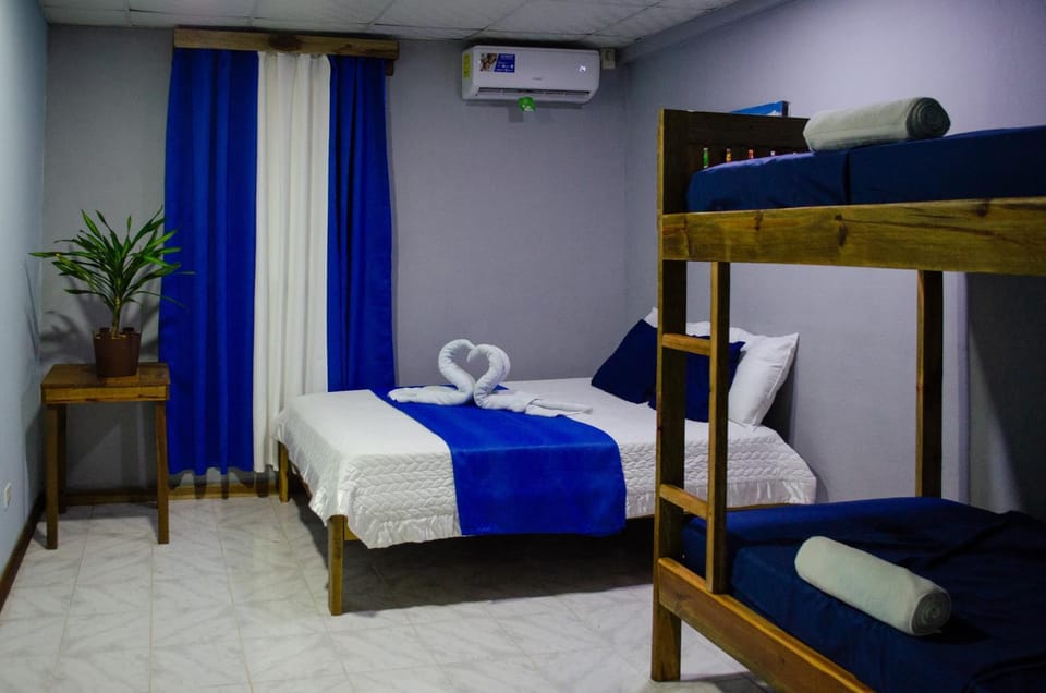 Bed, Photo of the whole room, towels, air conditioner