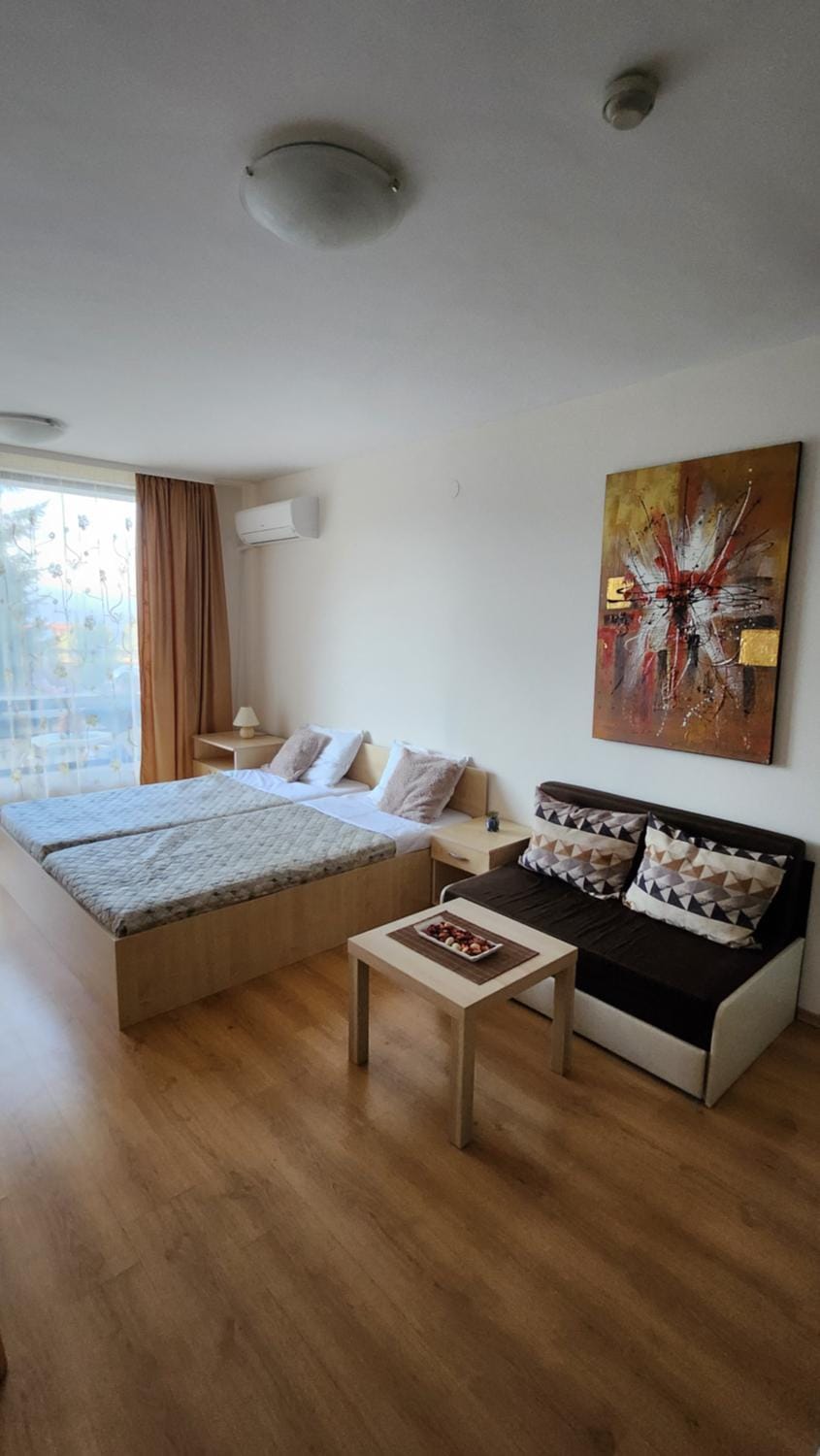 Bed, Living room, Seating area, Bedroom