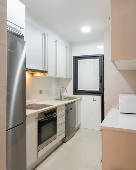 Kitchen or kitchenette, oven, stove