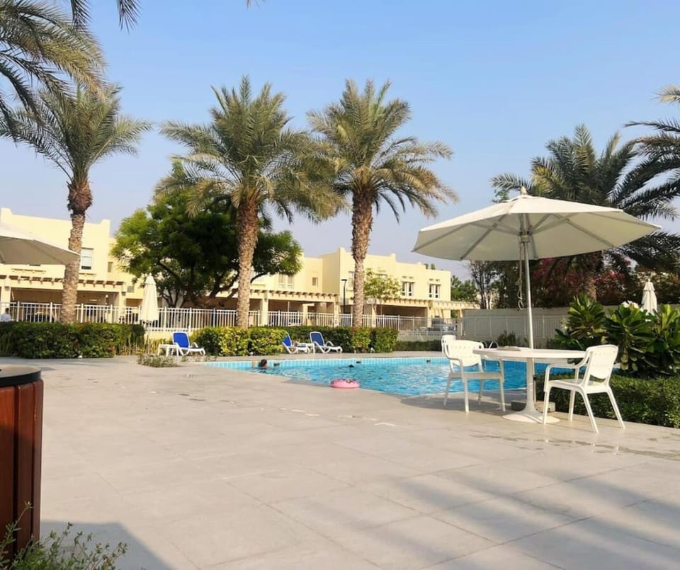 Backyard Bliss Villa in The Lakes 3BR plus maid's room Apartment in Dubai