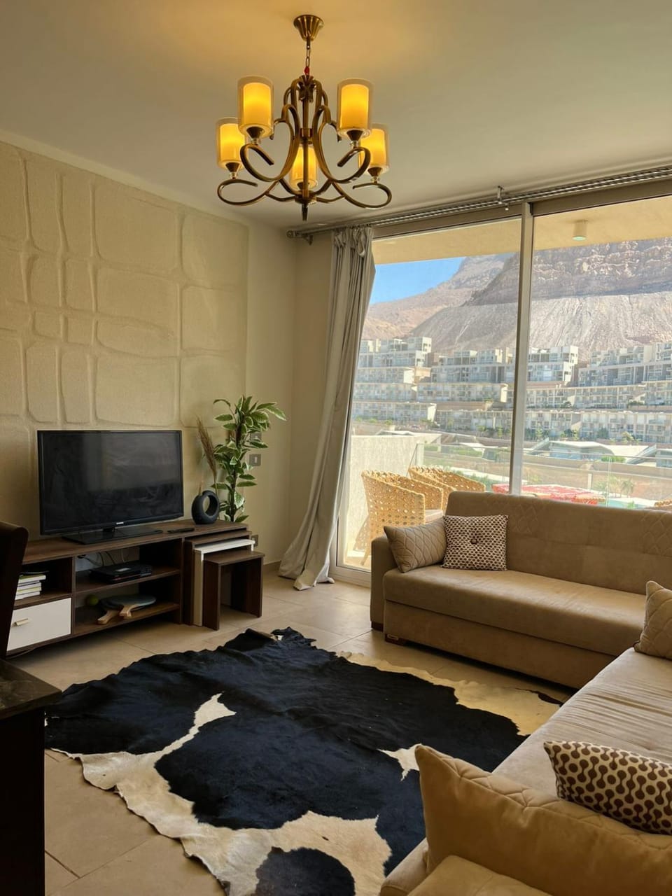 Communal lounge/ TV room, Natural landscape, Bird's eye view, TV and multimedia, View (from property/room), Living room, Seating area, Evening entertainment, Garden view, Landmark view, Landmark view, Mountain view, Mountain view, Pool view, Sea view, Quiet street view