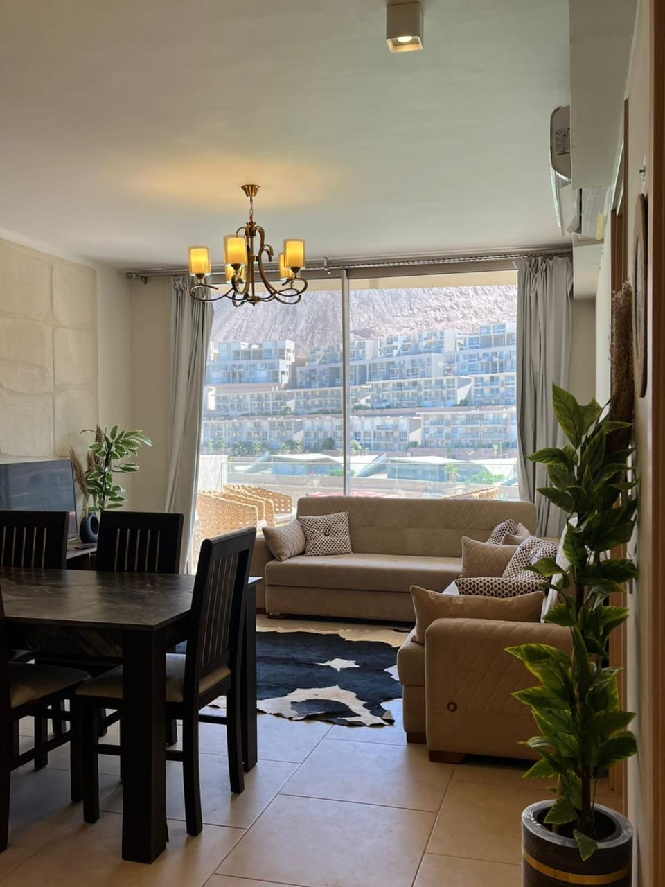 Living room, Seating area, Dining area, Mountain view, air conditioner