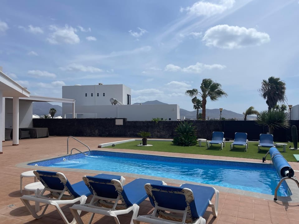 Property building, Living room, Swimming pool