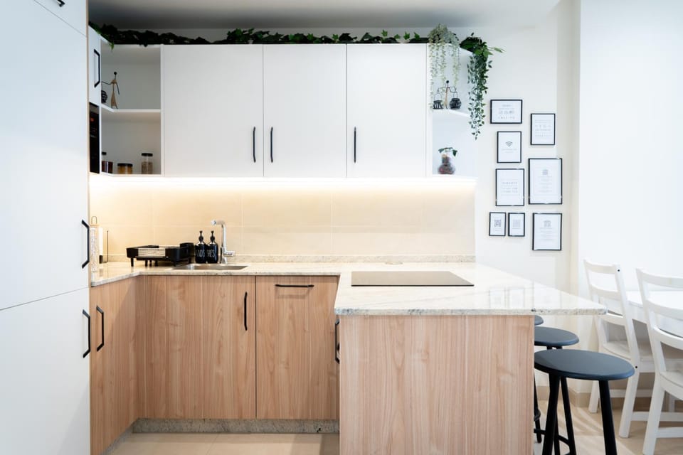 Kitchen or kitchenette, dishwasher, microwave, oven