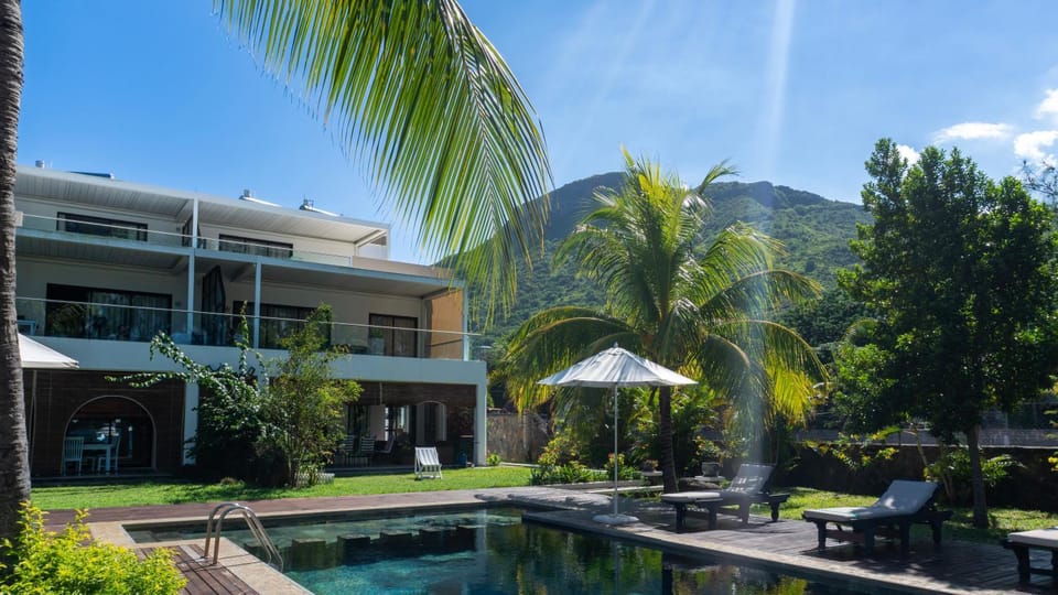 Property building, Day, Natural landscape, Garden, Pool view, Swimming pool, sunbed
