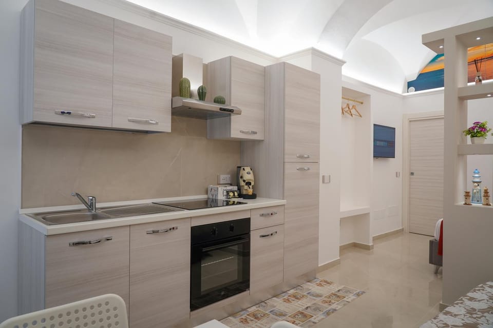 Kitchen or kitchenette, oven, stove
