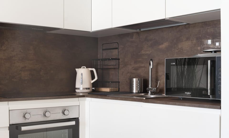 Kitchen or kitchenette, stove