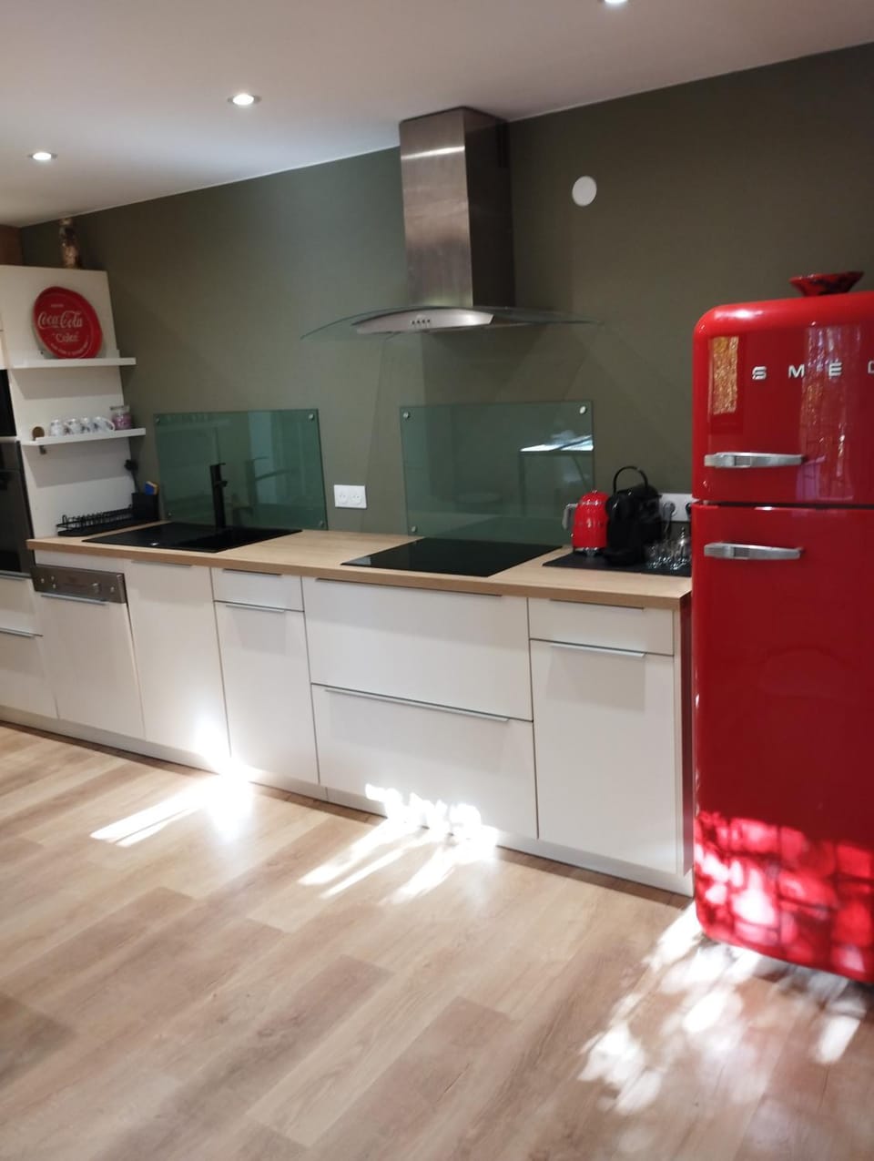 Kitchen or kitchenette, dishwasher, oven, stove