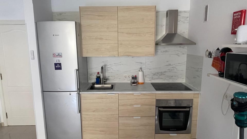 Kitchen or kitchenette, oven, stove