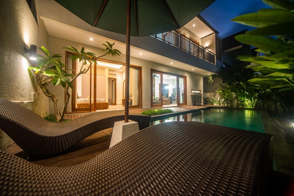 Patio, Night, Pool view, Swimming pool, sunbed